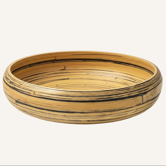 Bol en bambou naturel vu de face sur fond uni, modèle Maison Moka.
